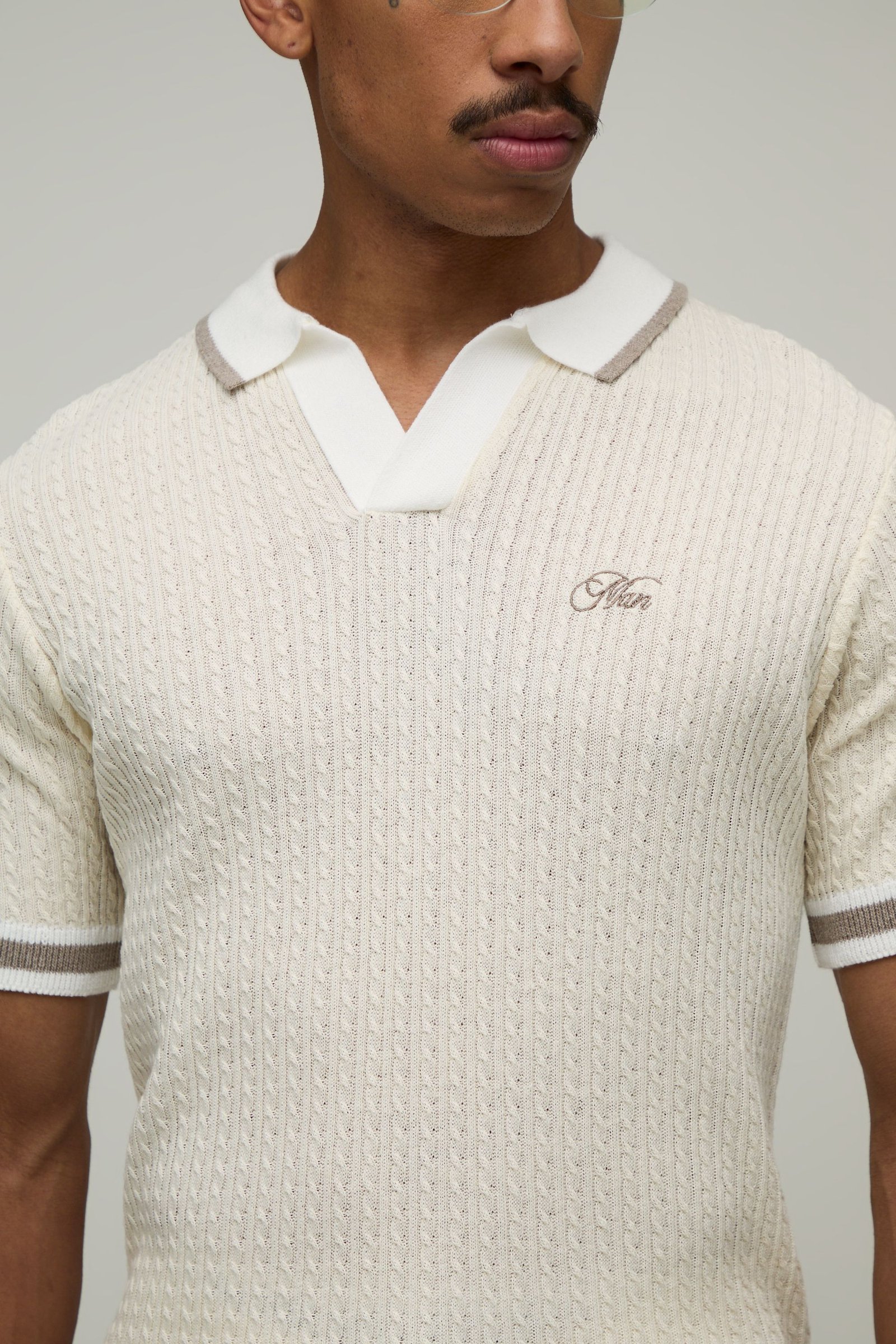 Polo l r'rjal f maille torsadée brodé coupe wasi3a