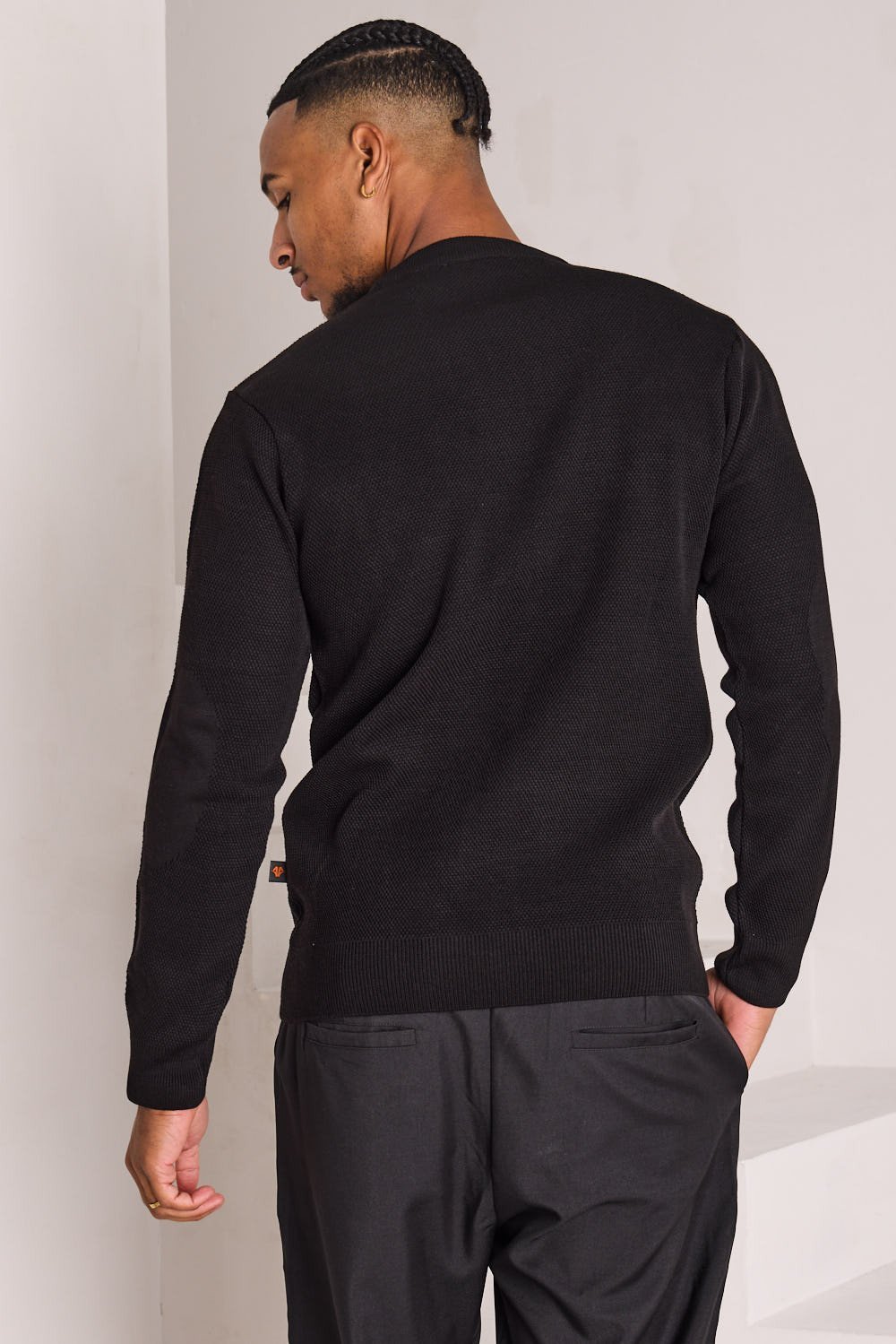 Black knit crew-neck jumper