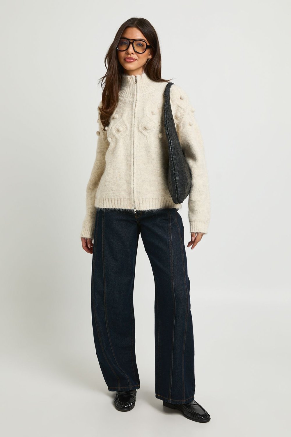Cardigan zippé torsadé à pompons crème