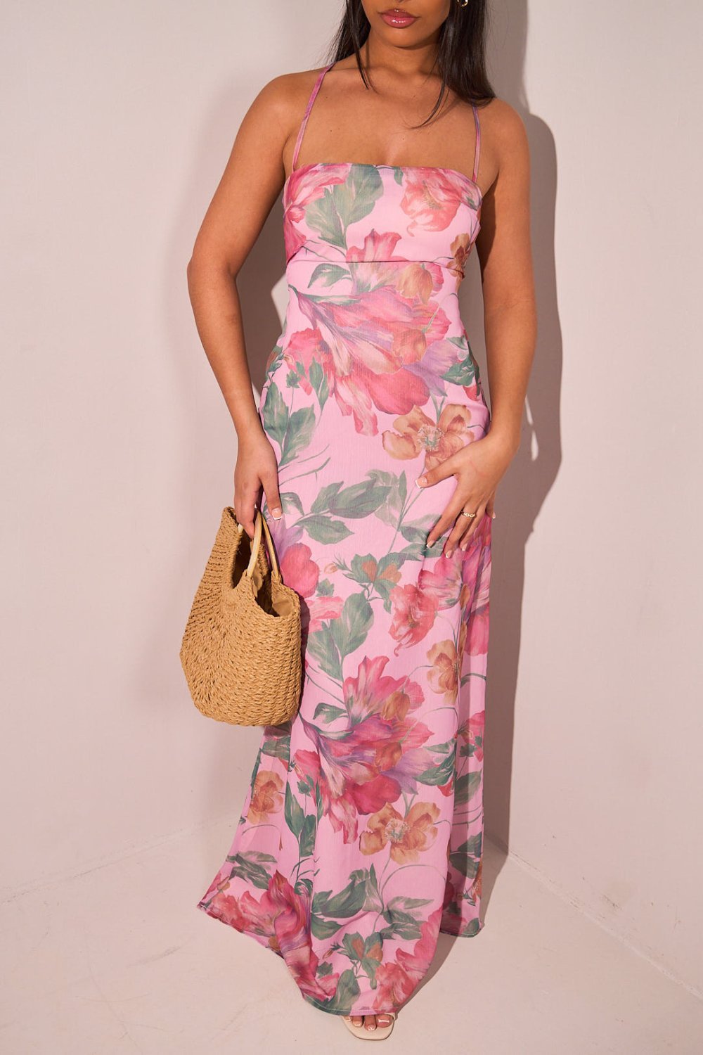 Robe mi-longue fleurie dos nu à lacets rose