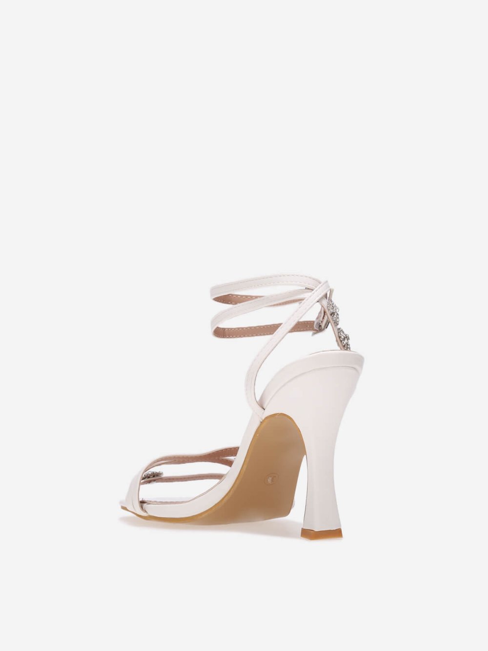 White spool heel sandals with star charms