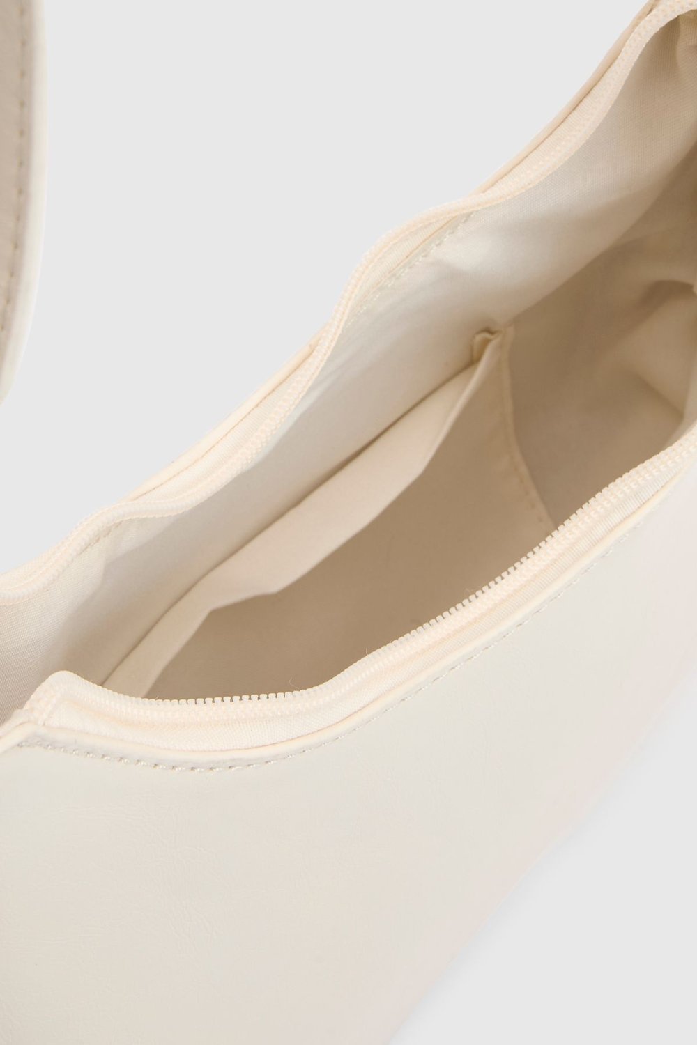 Ecru half-moon bag