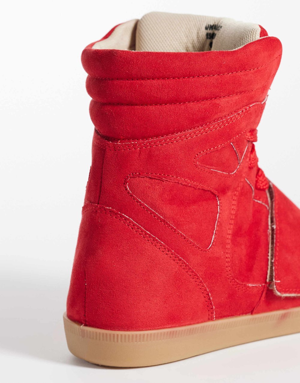 Hidden wedge faux suede trainers in red