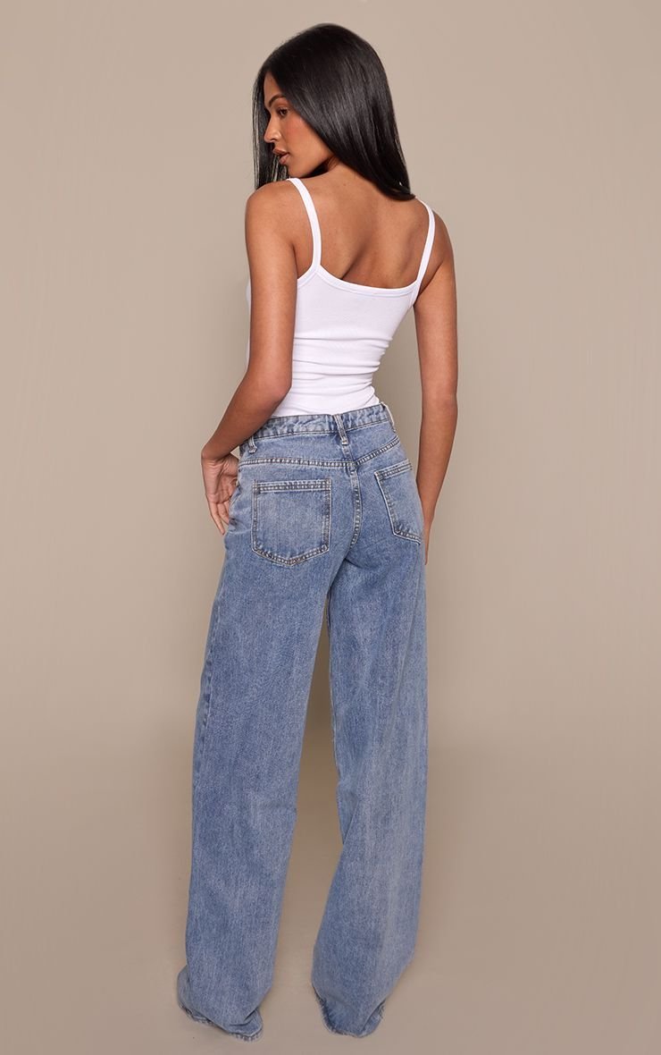 Jean large taille haute b khyata bayna - Tall