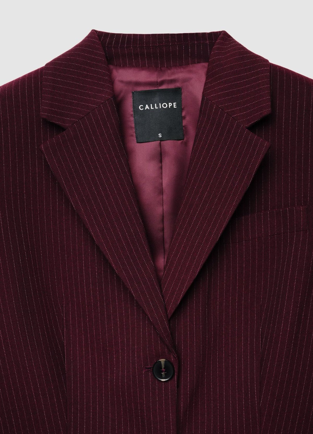 Blazer mkhetet b jouj boutons