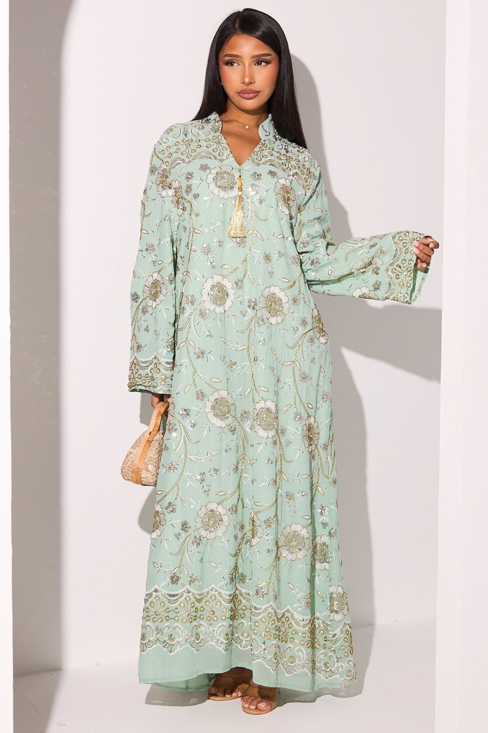 Light green abaya with beaded floral motifs