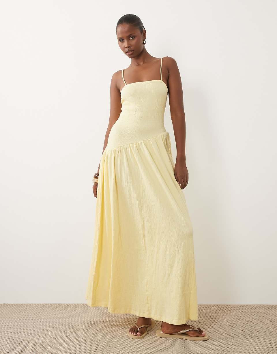 Robe mi-longue froissée à fines bretelles nouées dans le dos et taille asymétrique - Babeurre