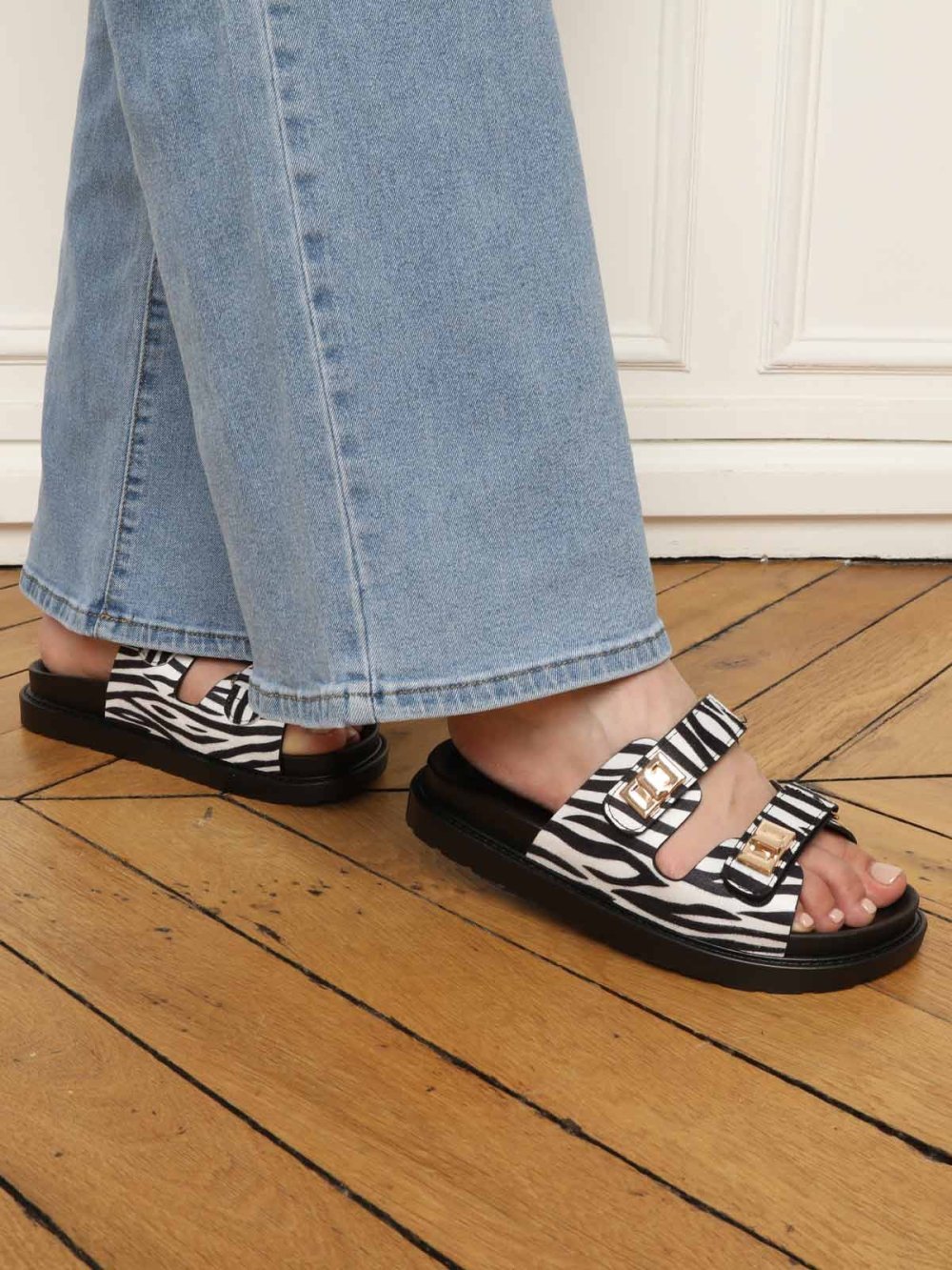 Black and white platform mules with straps