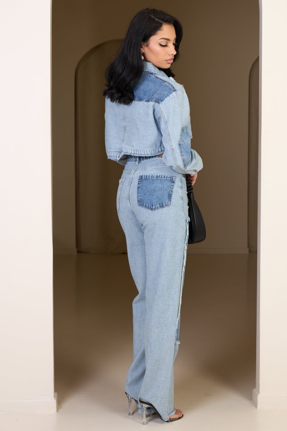 Short blue frayed denim jacket