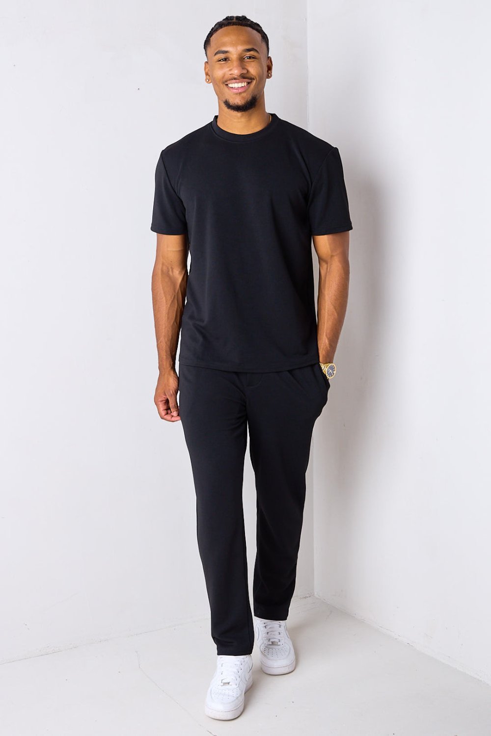 Black piqué knit t-shirt and trousers set