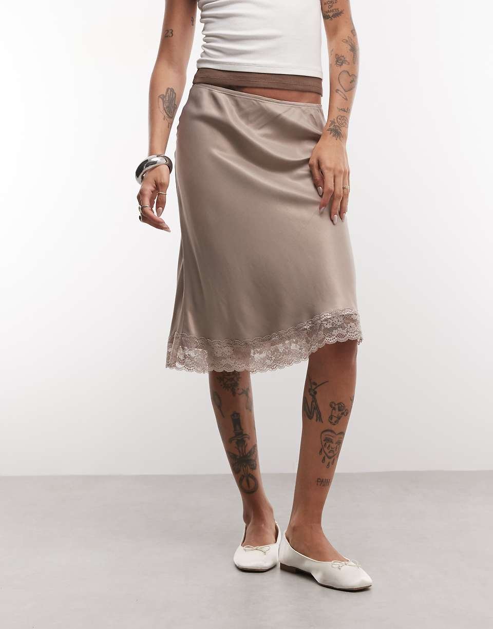 Jupe midi en satin à bordure en dentelle