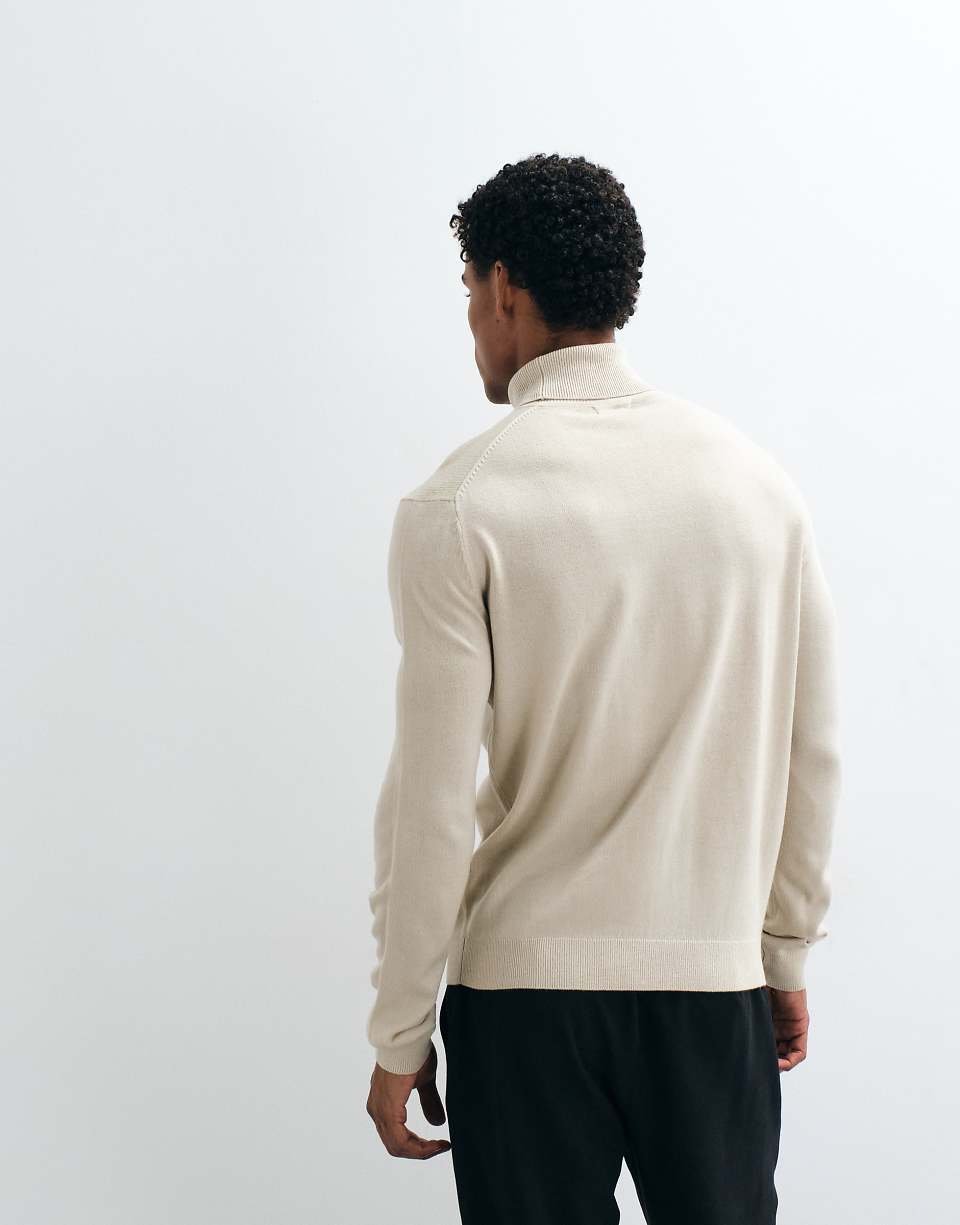 Pull col roulé en crème