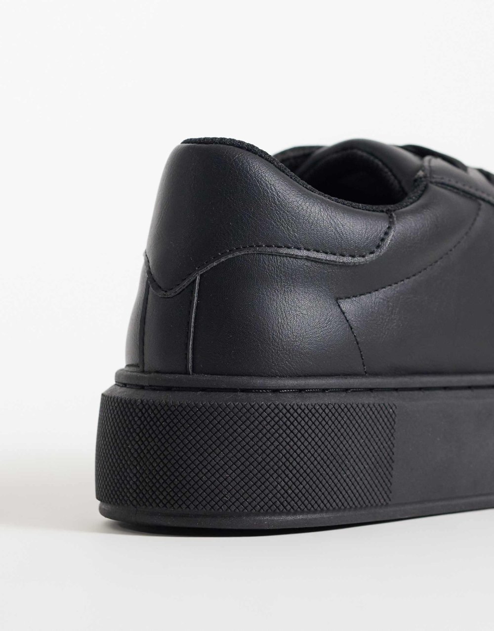 Baskets en similicuir noires