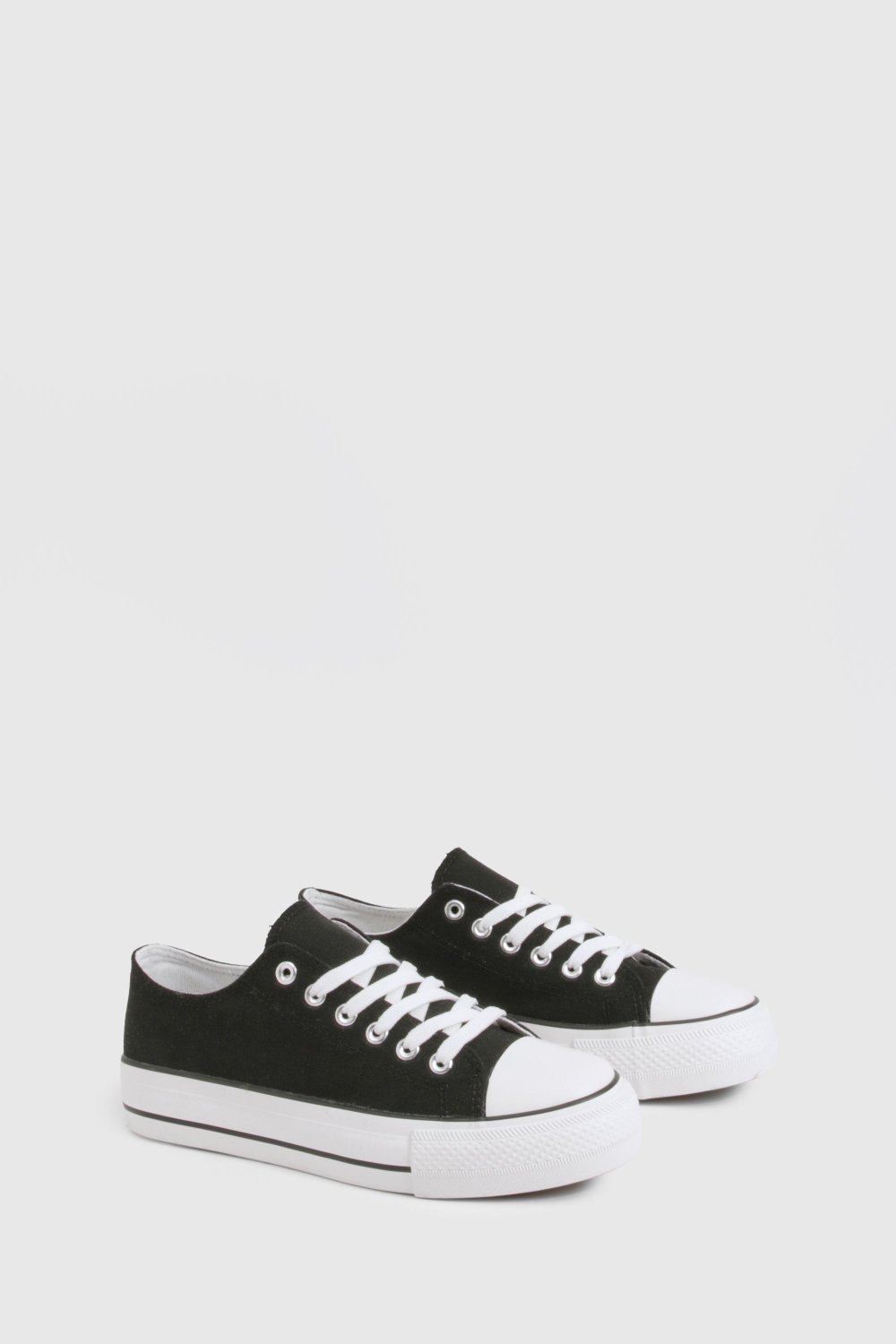 Black platform trainers