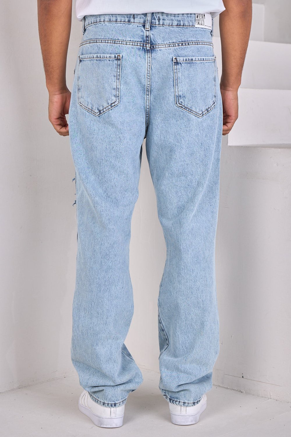 Light blue ripped baggy jeans