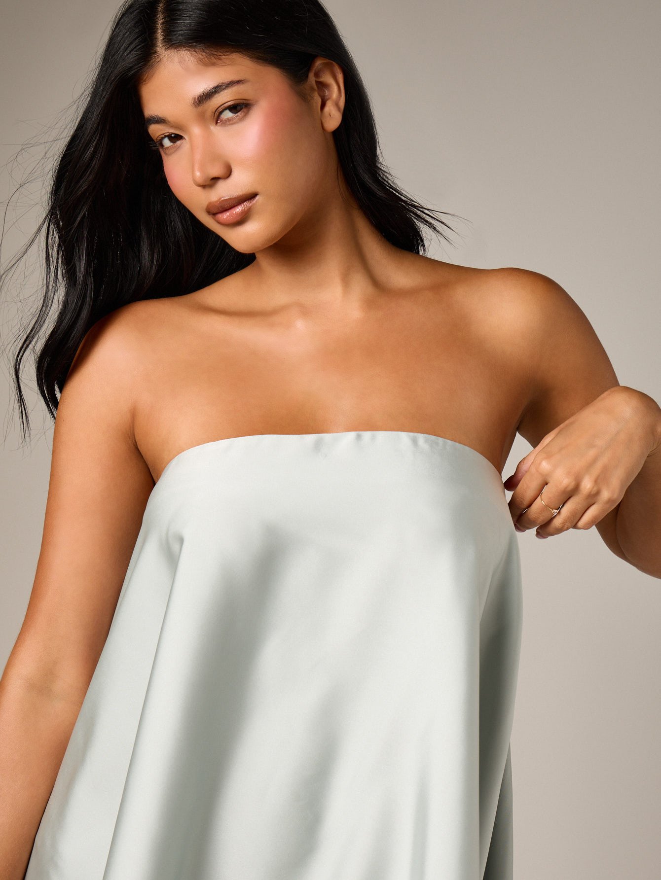 Satin bandeau mini dress with asymmetric hem