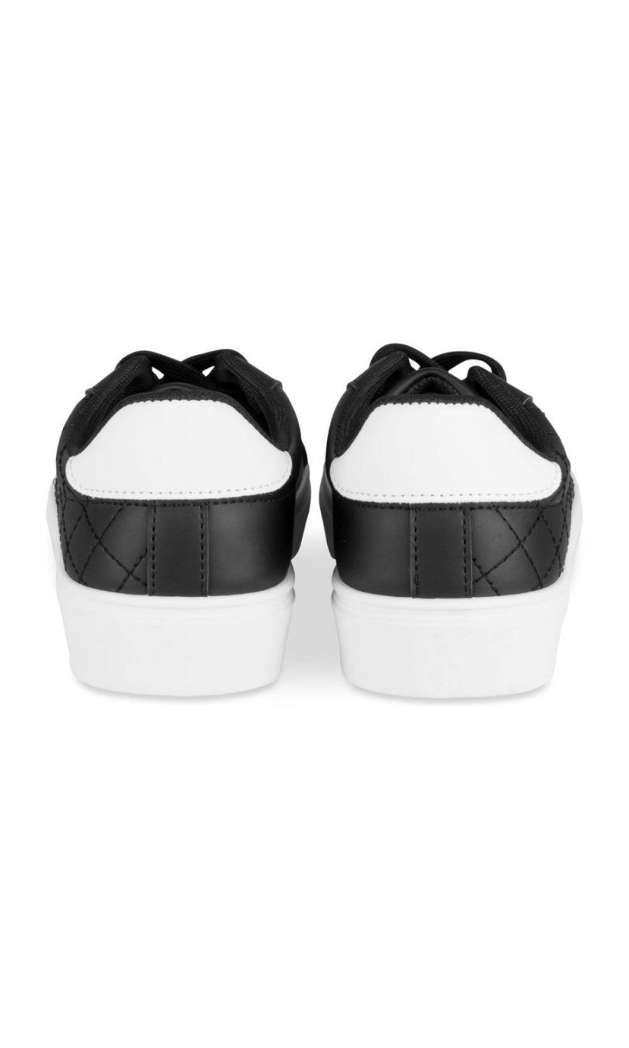 Black quilted sneakers, white heel tab