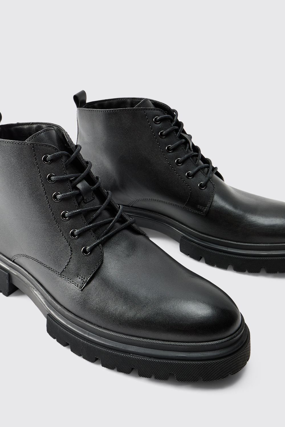 Botte chunky à lacets en cuir verni authentique