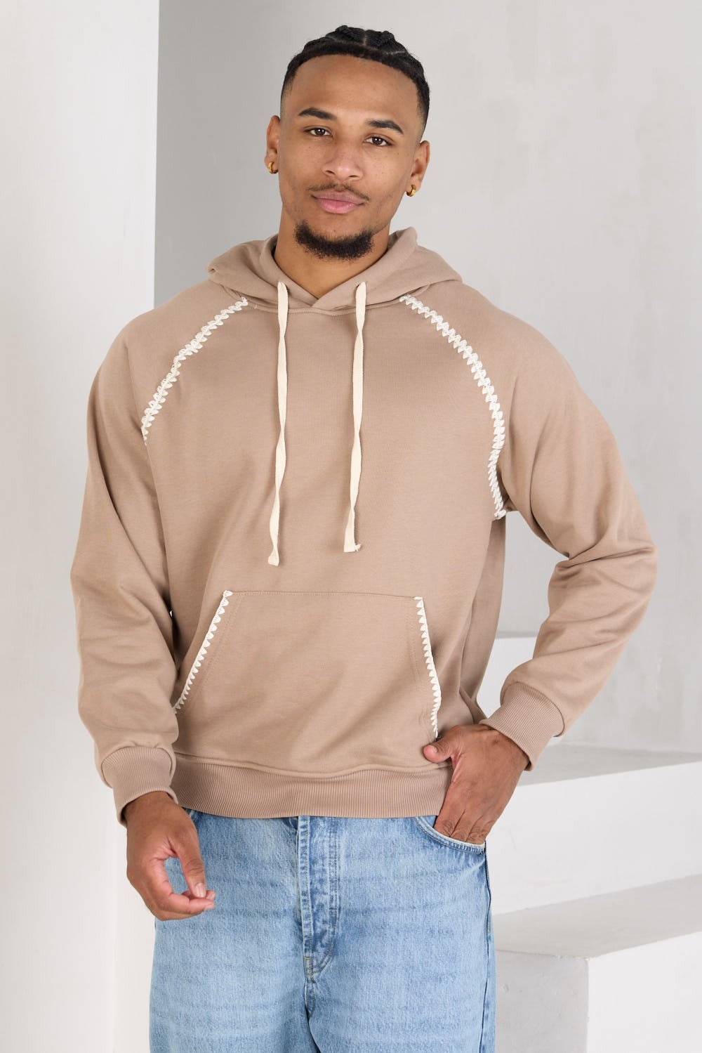 Beige hoodie with stitching details