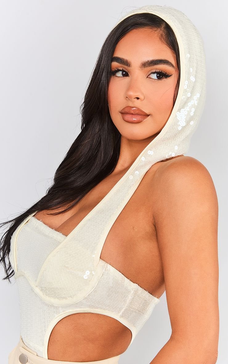 Body b sequins, capuche w découpes