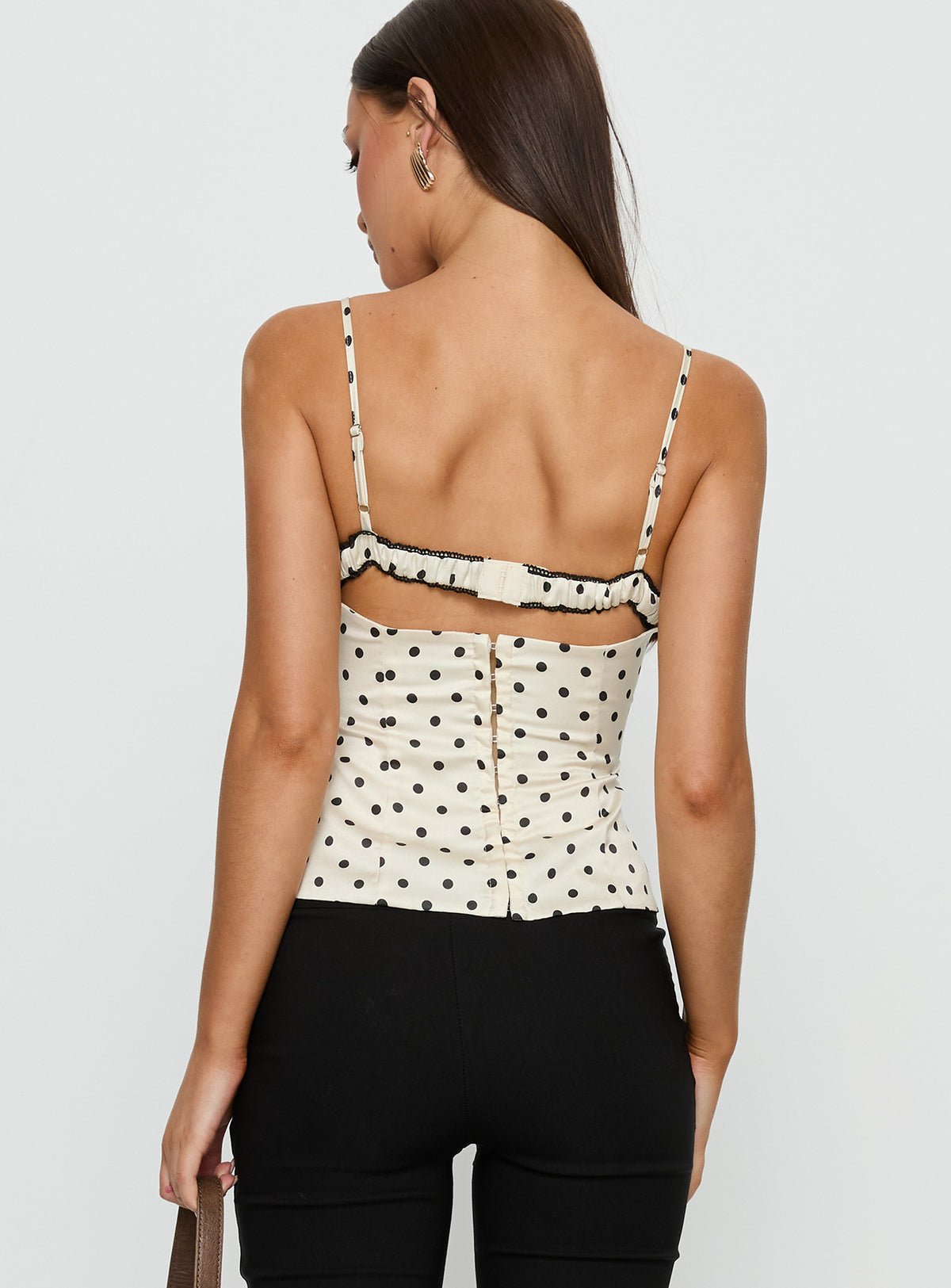 Top corset à pois bordé de dentelle