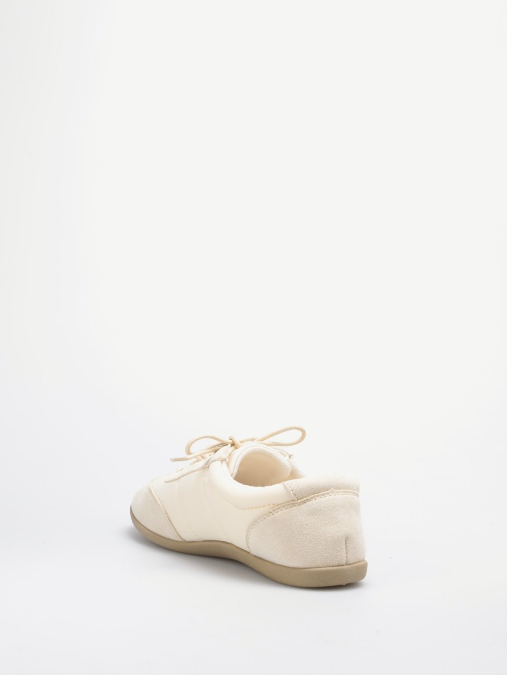 Beige quilted and faux suede trainers