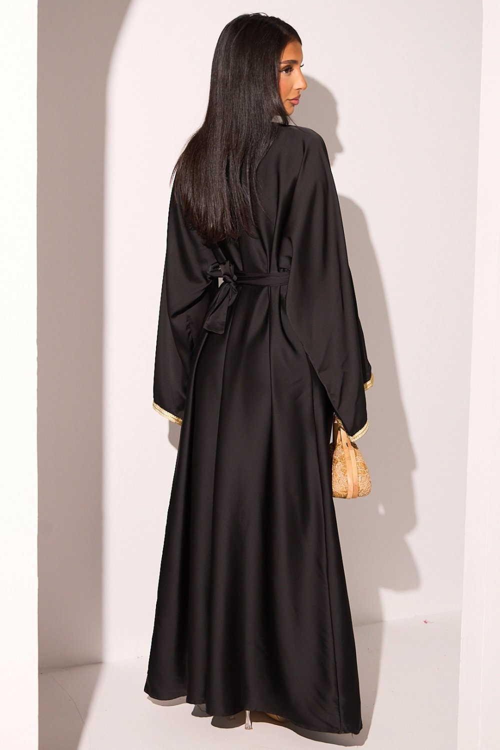 Black satin abaya with gold panel and rhinestones