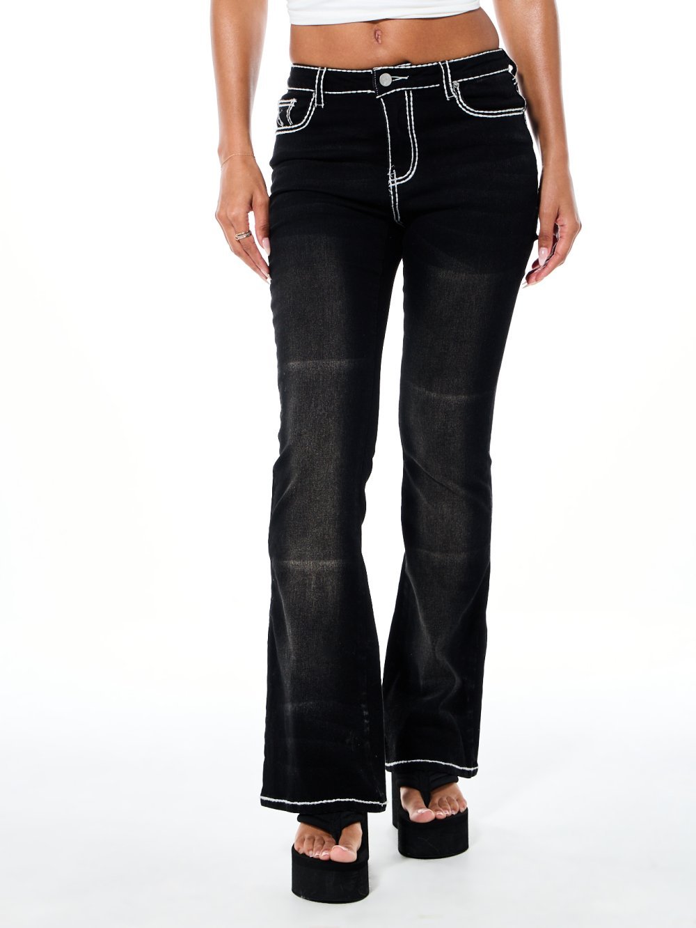 Jean évasé taille haute à coutures apparentes