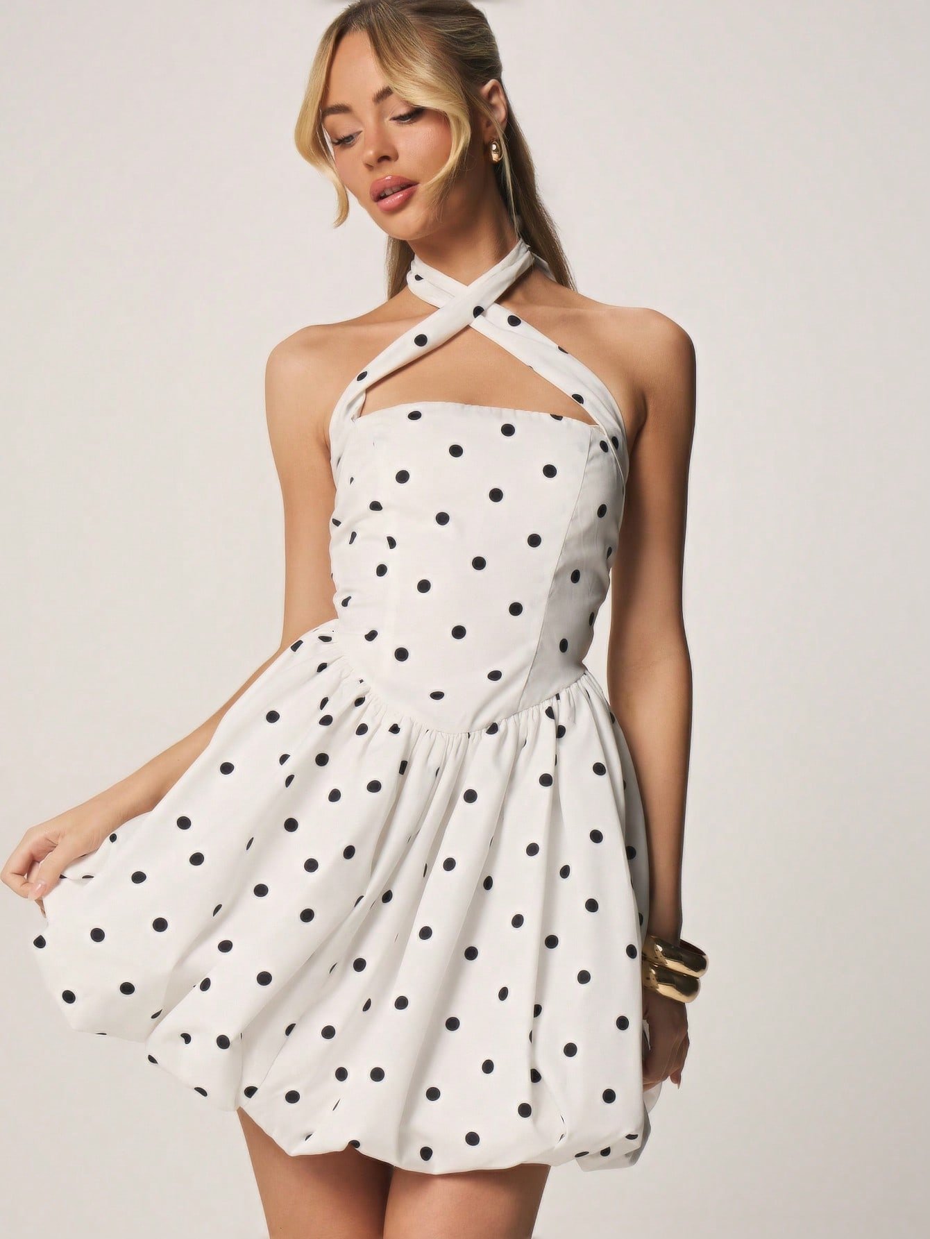 Backless polka dot mini dress