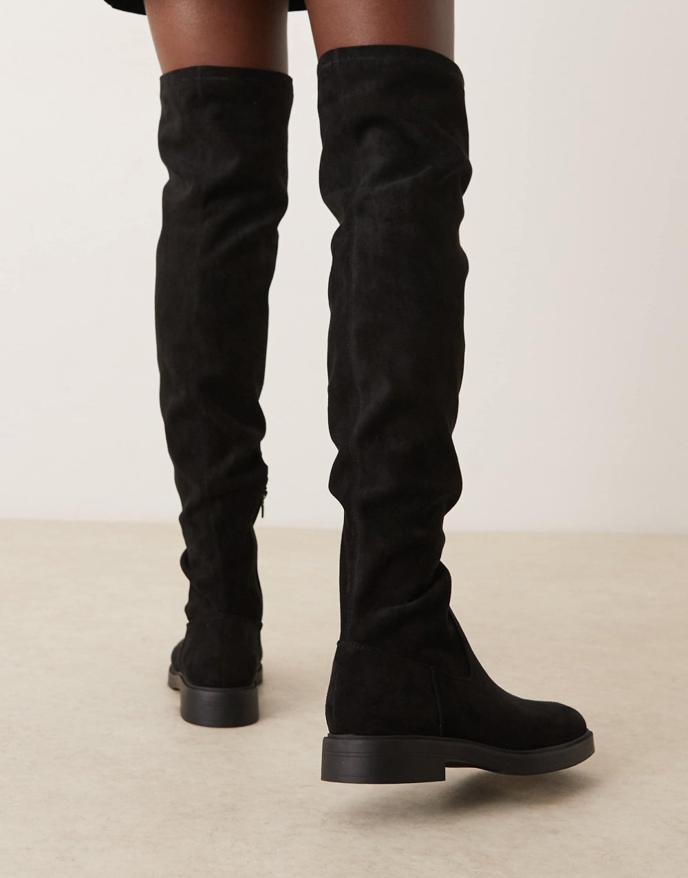 Flat faux suede thigh high boots in black