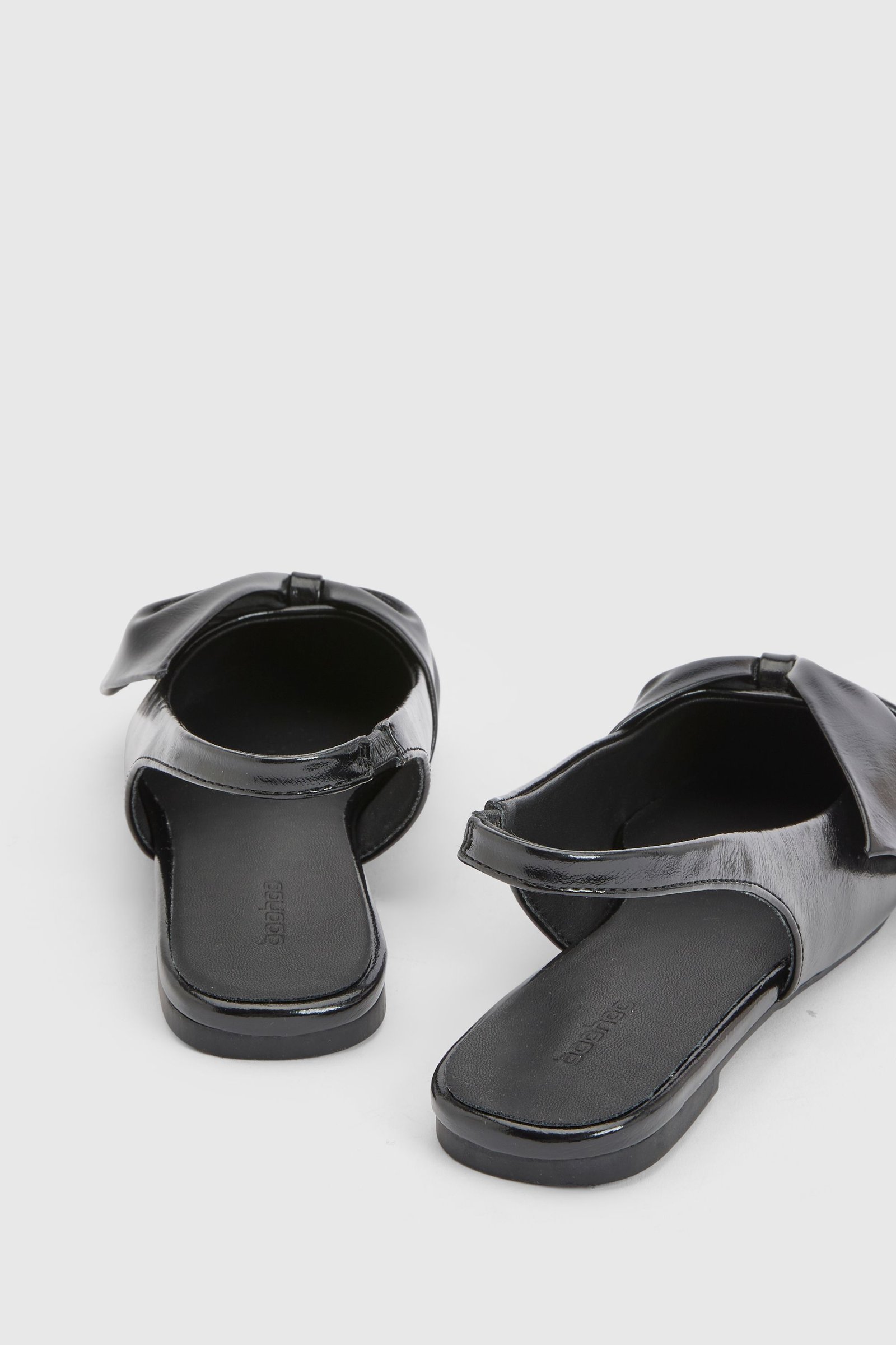 Pointed slingback bow ballet flats