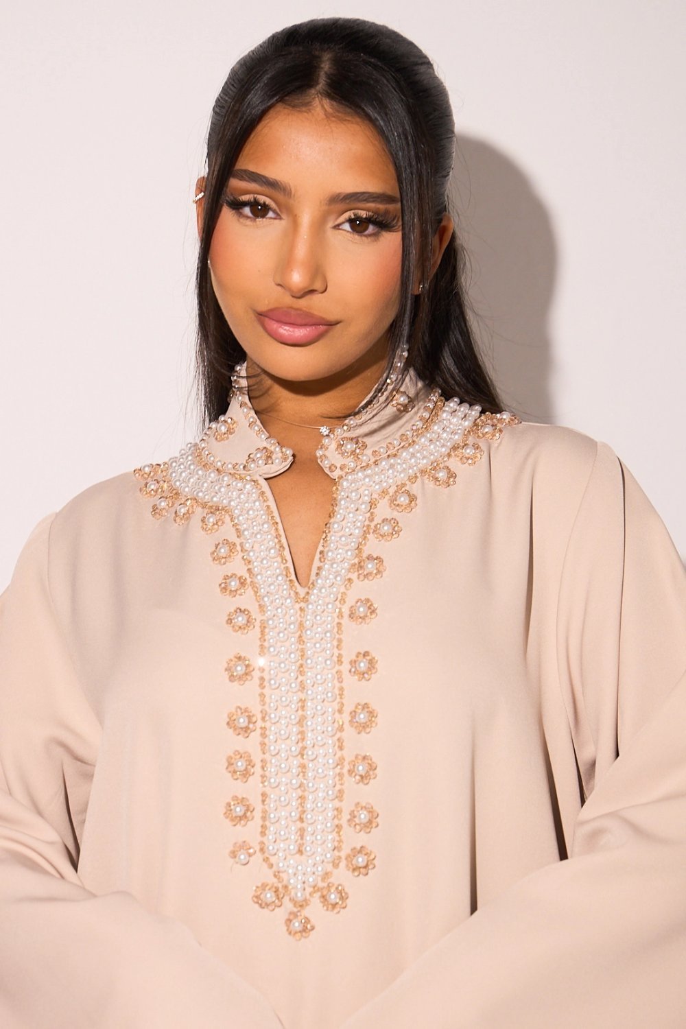 Taupe V-neck abaya with beaded flowers