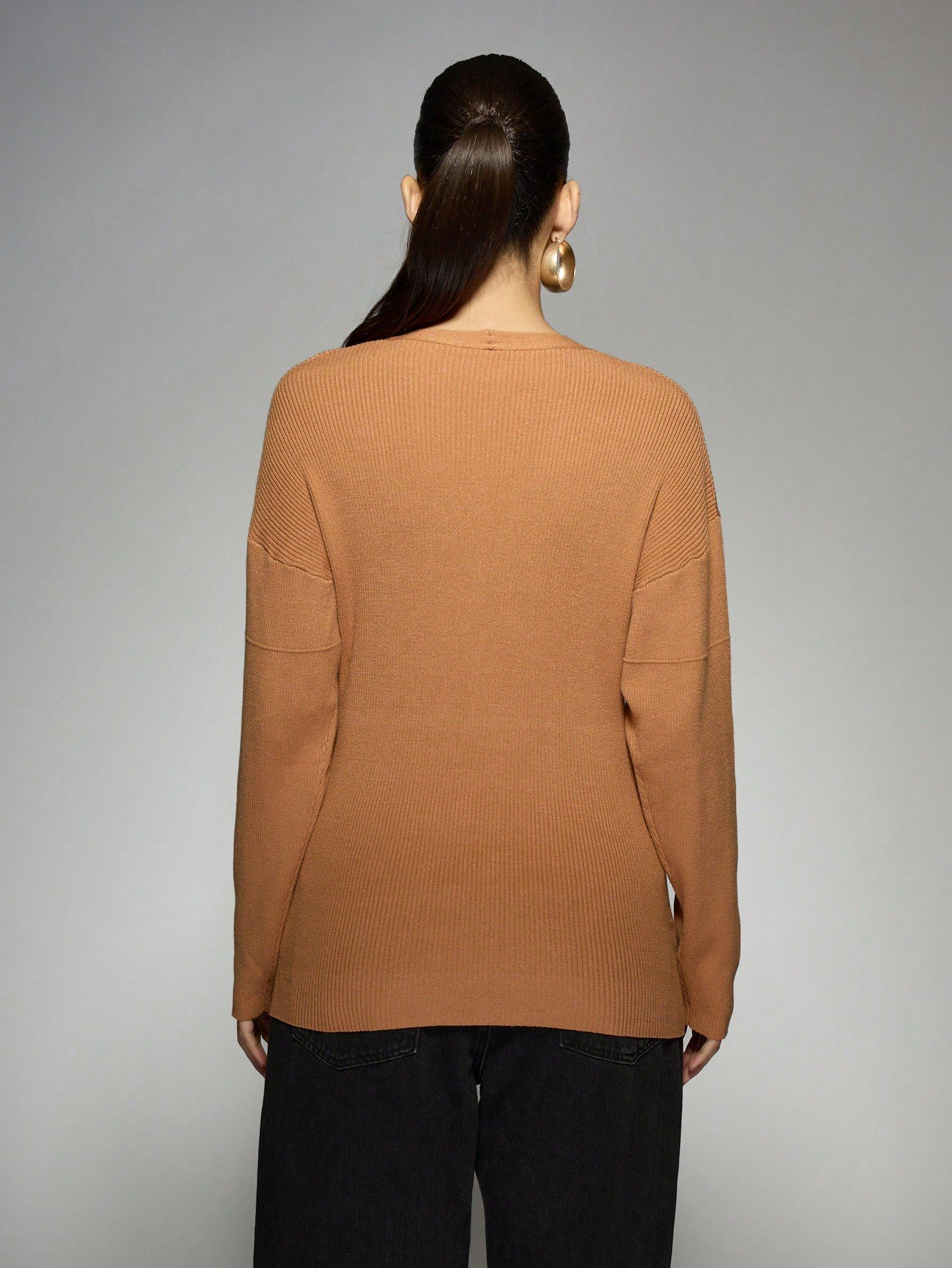 Cardigan asymétrique en maille côtelée avec boutons