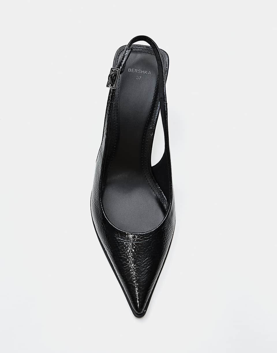 Slingback low-heel pumps in black