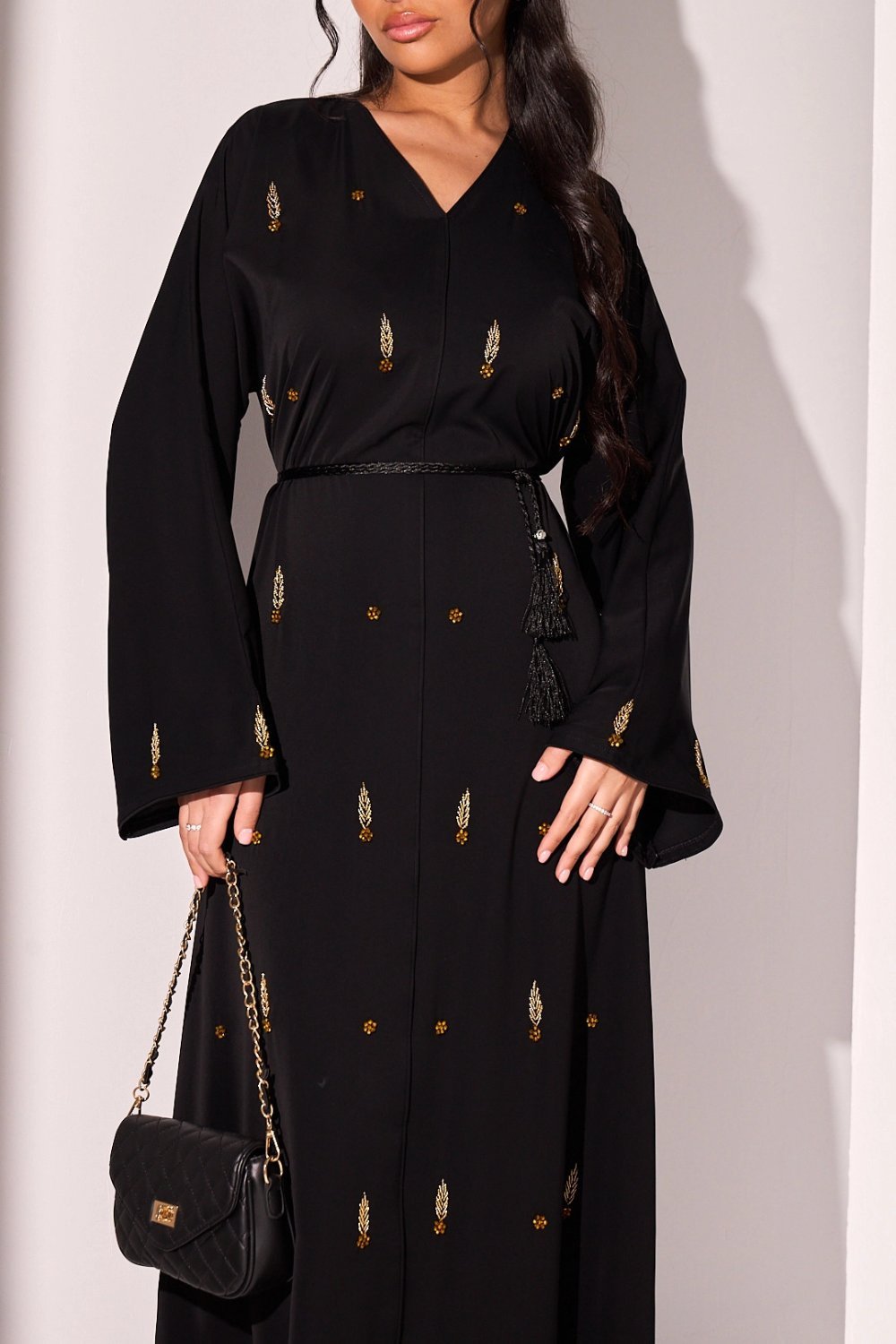 Abaya k7la b strass dorés snabel w wrud
