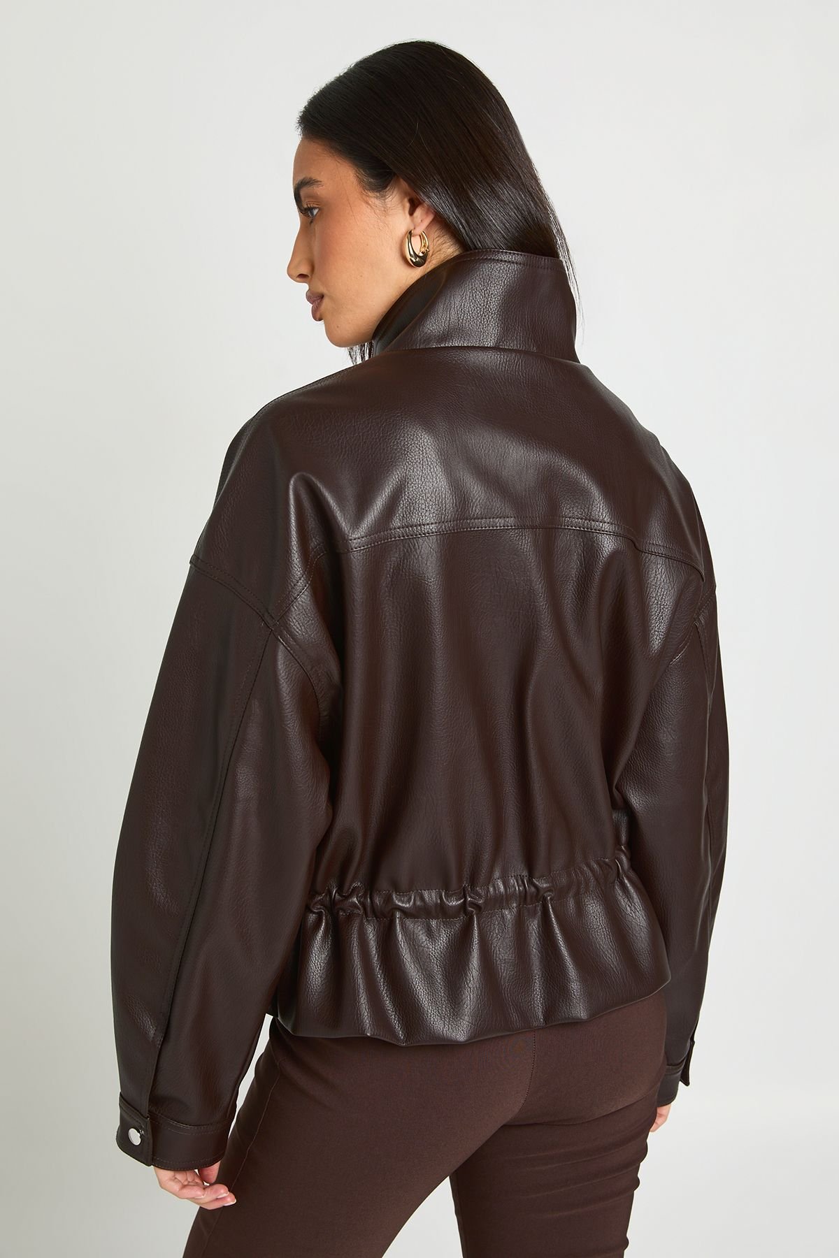 Veste b similicuir b col montant w khsar mchdoud