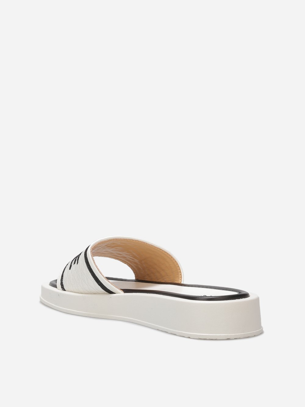 White platform mules with quilted strap