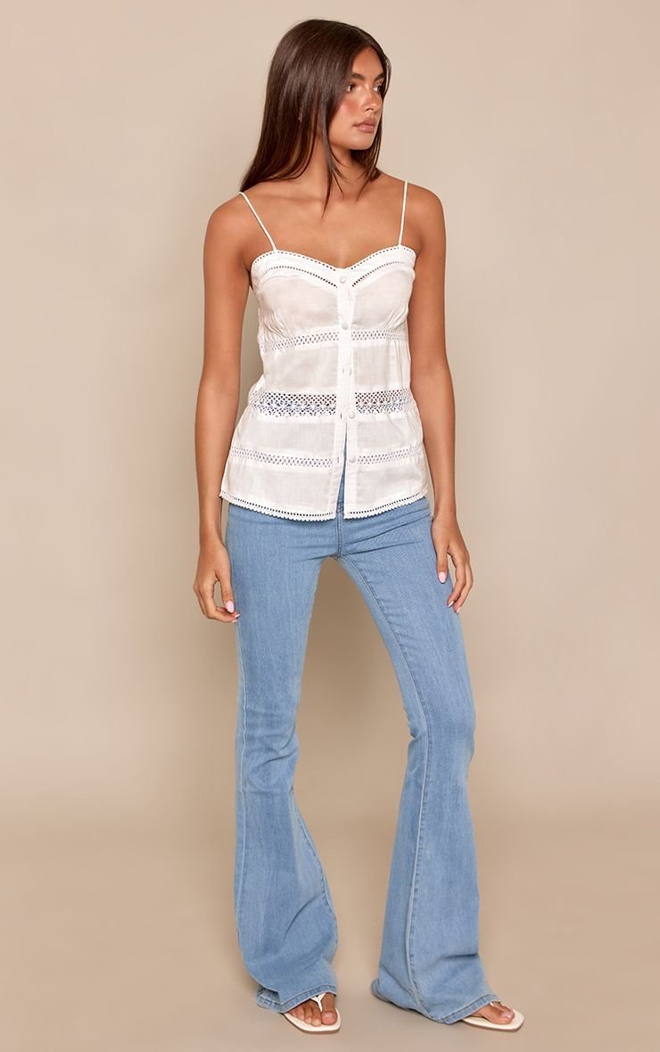 Blue five-pocket flared jeans
