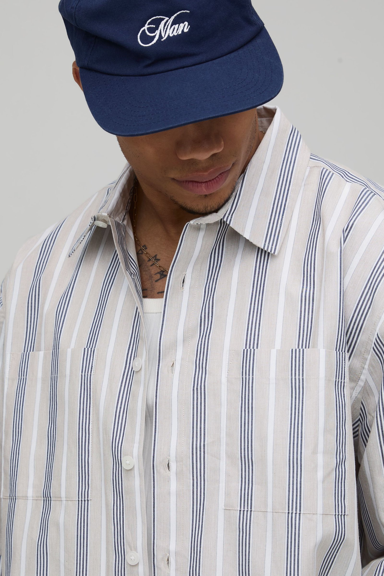 Chemise b khtout oversize 9sira boxy b kmam twal
