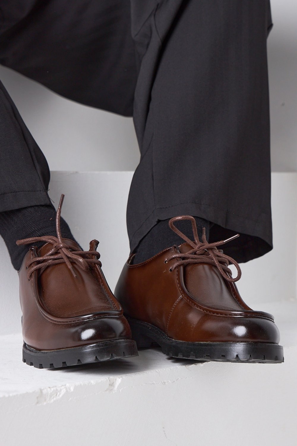 Brown lace-up shoes with chunky lug soles
