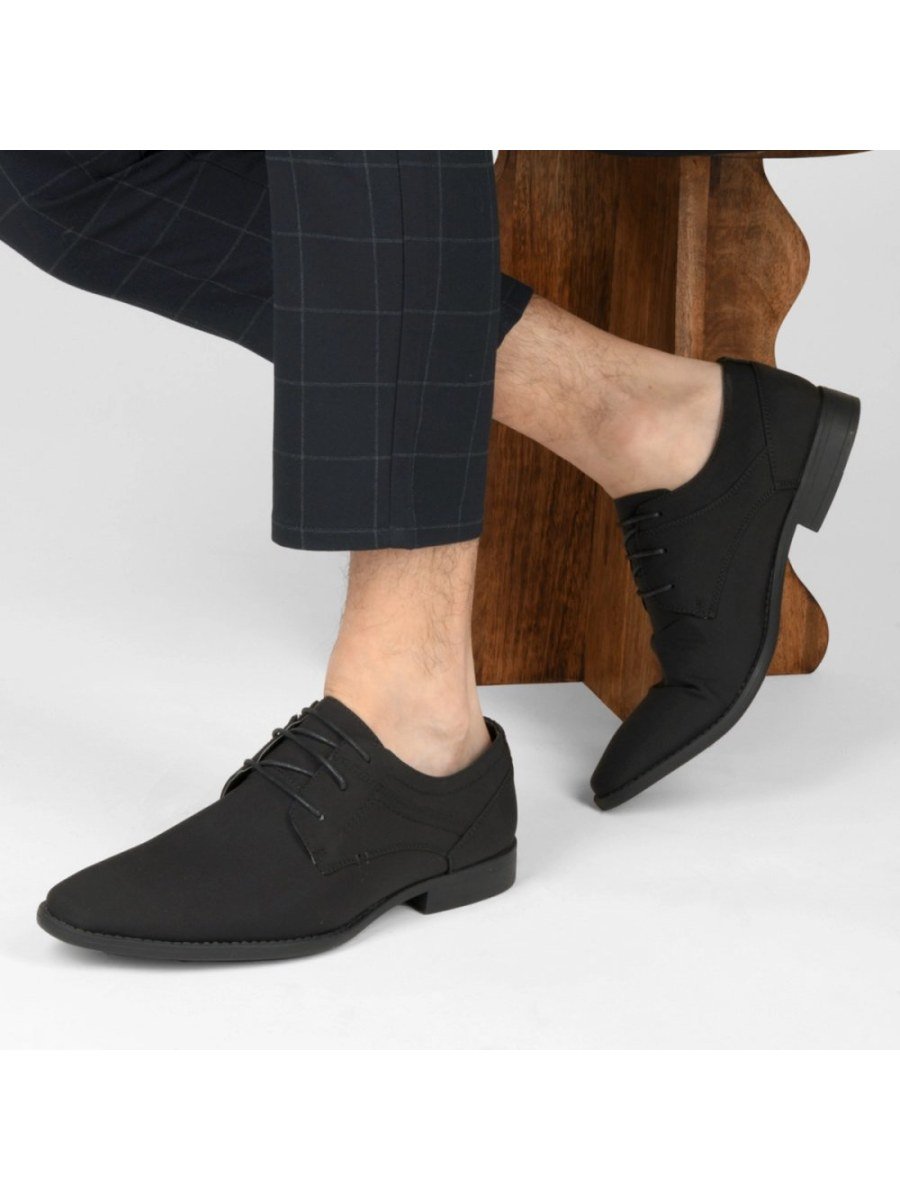 Black derbies with side stitching