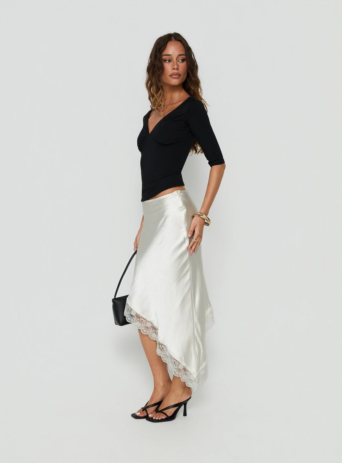 Asymmetric satin midi skirt with lace