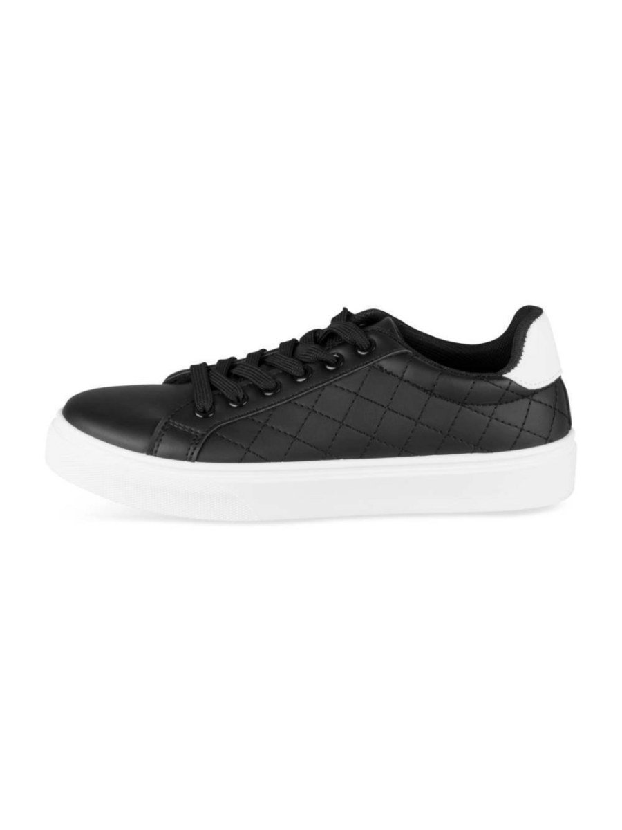 Black quilted sneakers, white heel tab