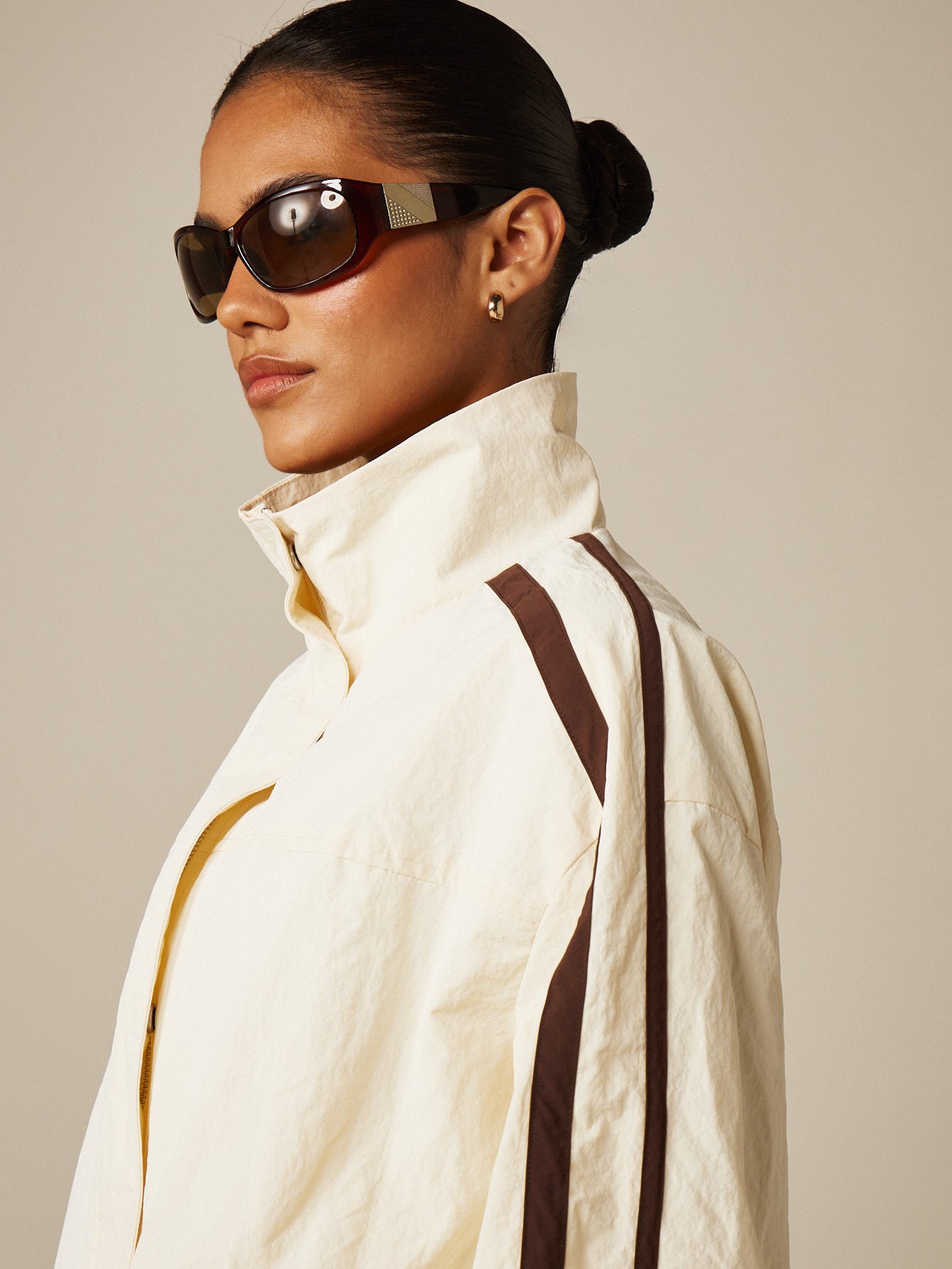 Nylon windbreaker jacket with contrast piping