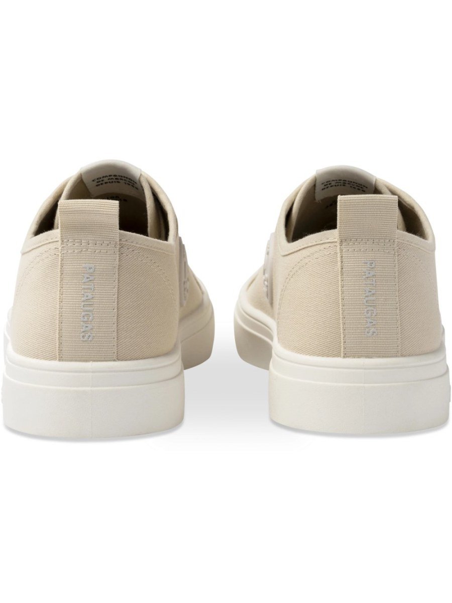 Beige canvas sneakers with rubber toe