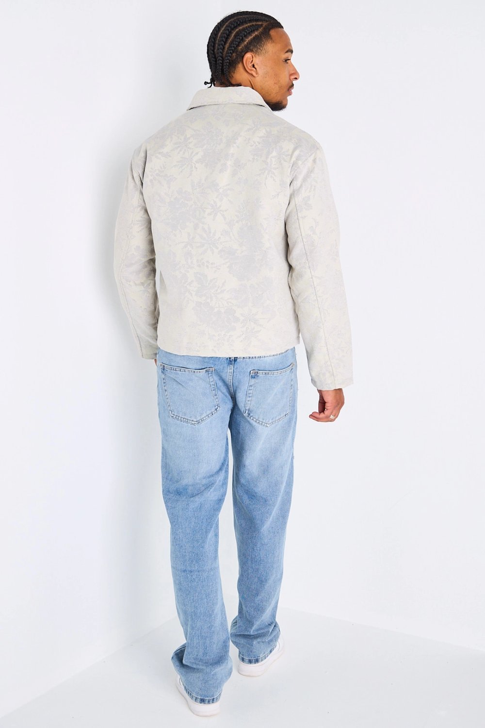 Light grey zip-up jacket with floral print