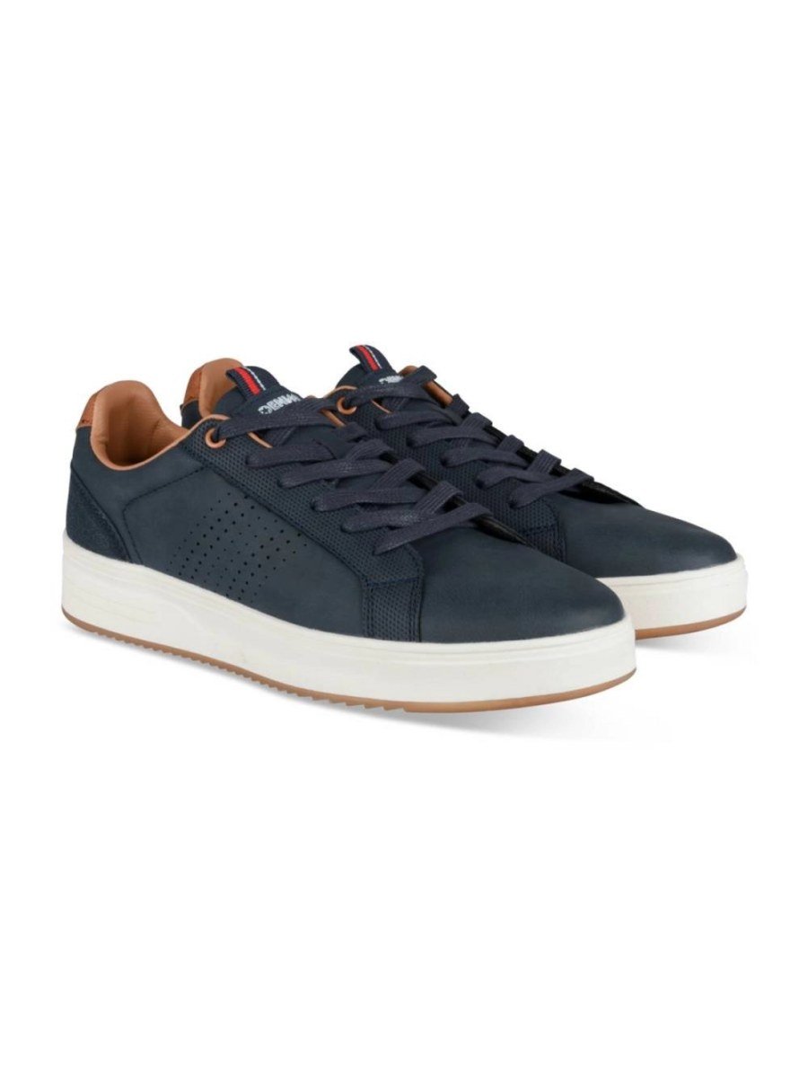 Navy perforated sneakers with tan collar