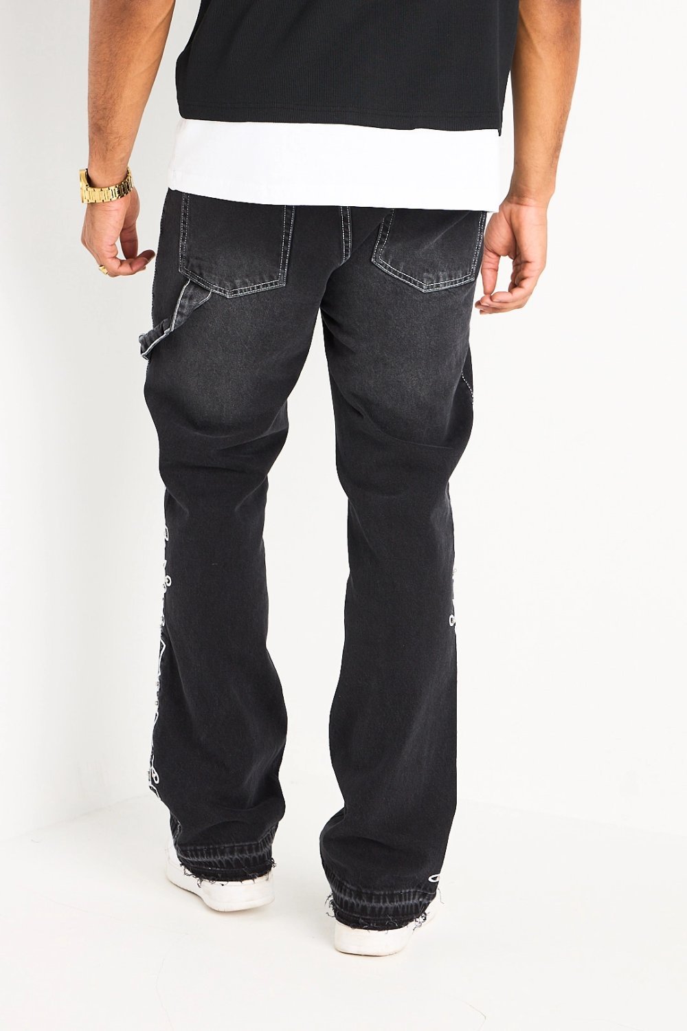 Black straight jeans with arabesque pattern