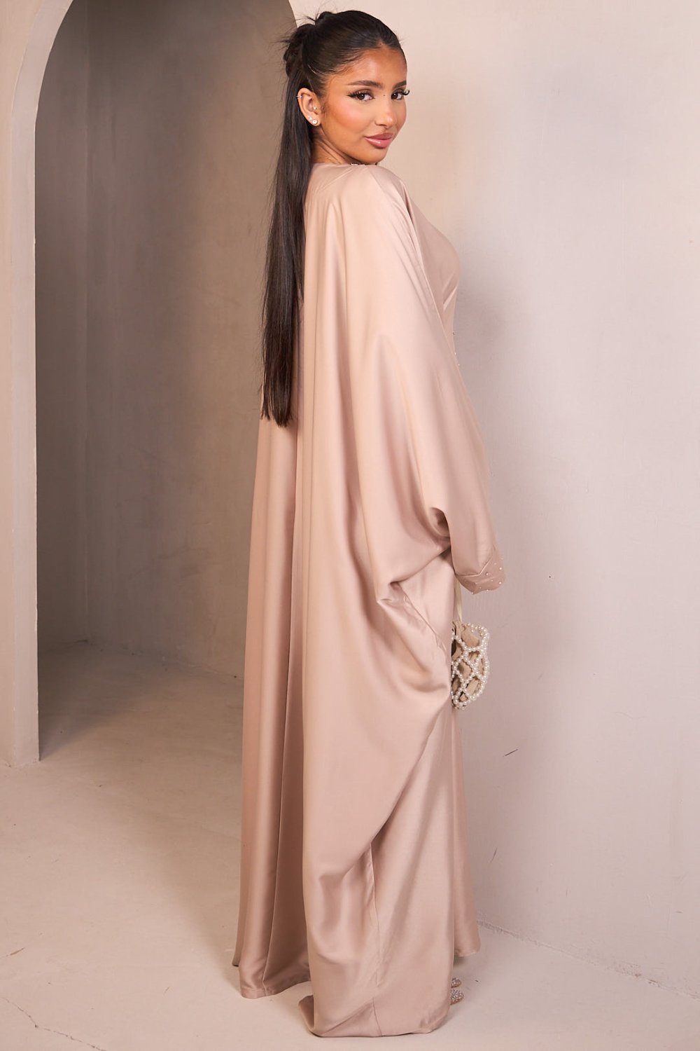 Beige satin abaya with beaded V-neck