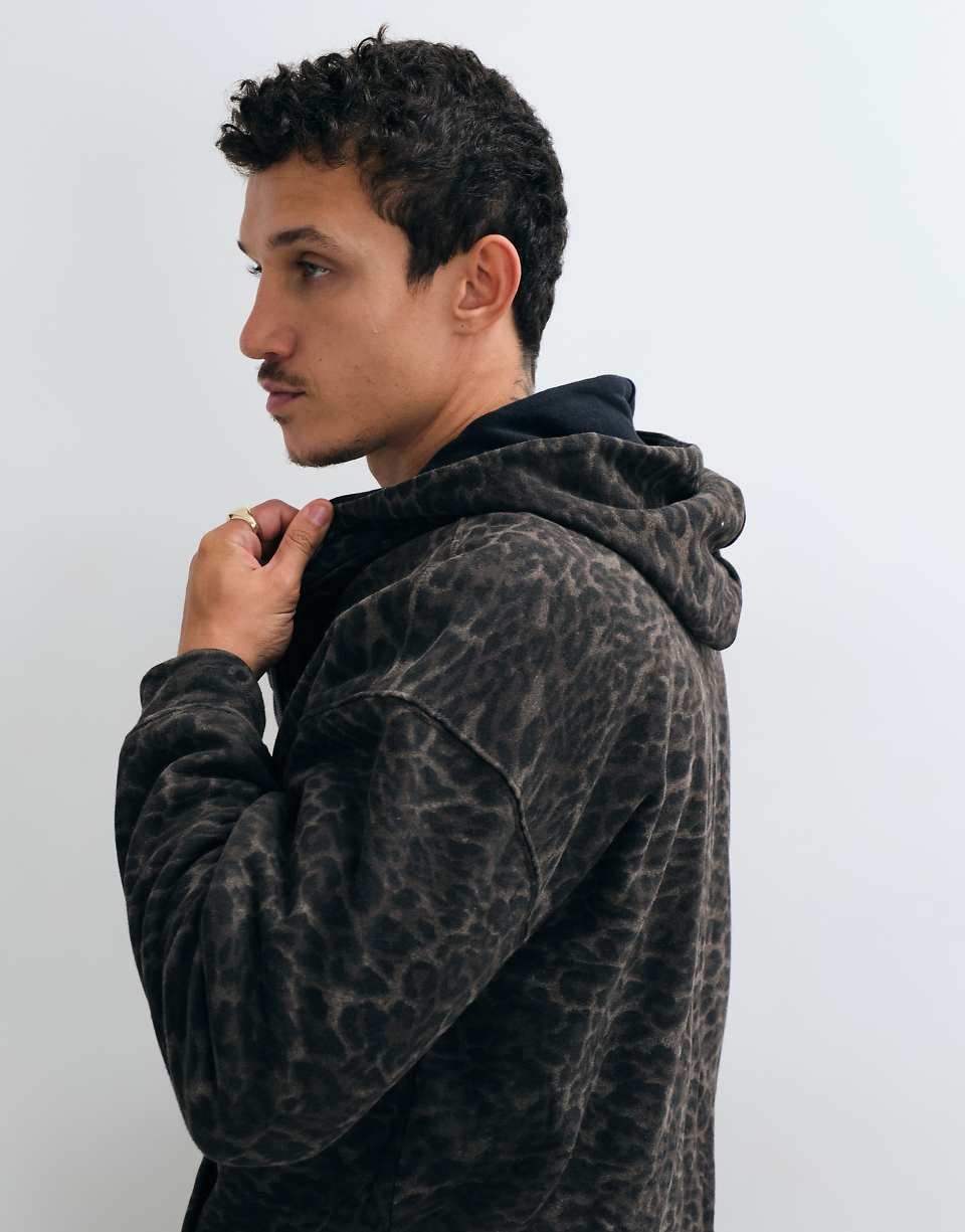 Sweat à capuche zippé réversible noir et léopard
